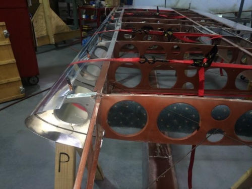 Strapped and clamped in place.