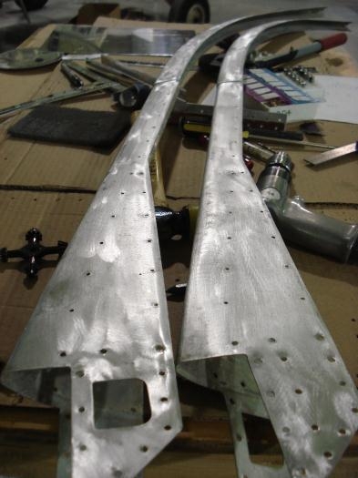 Leading edges straightened.