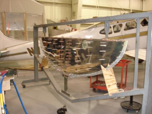 Prepping for skin riveting.