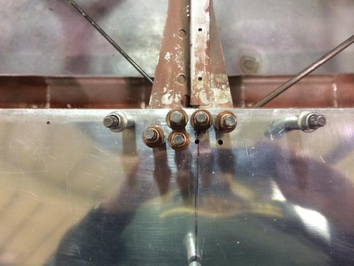 Holes drilled at rib-spar juncture.