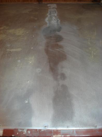 Wing panel corrosion sanded.