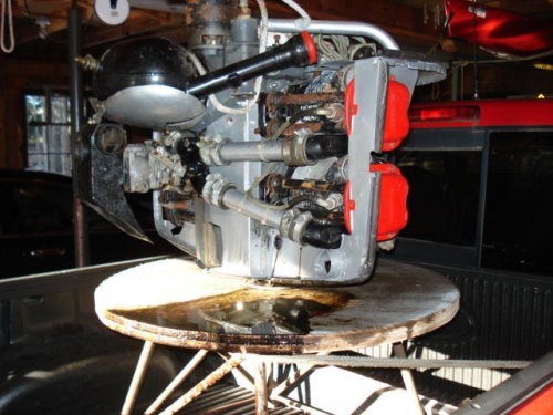 Engine on stand in truck.