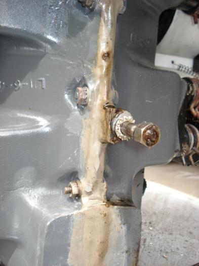 Old patch for oil leak.