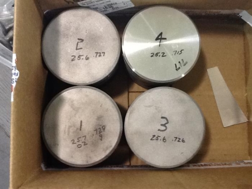 Pistons with weights.