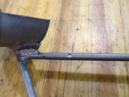 Muffler bracket ready for welding.