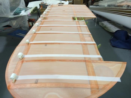 Right bottom chord-wise finishing tapes staged.