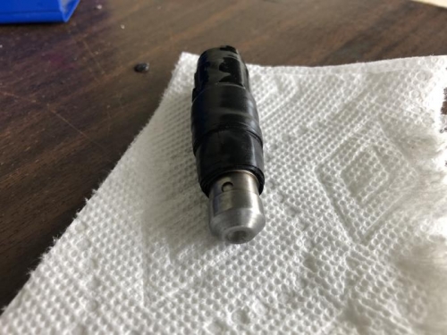 Plunger wrapped for lapping.