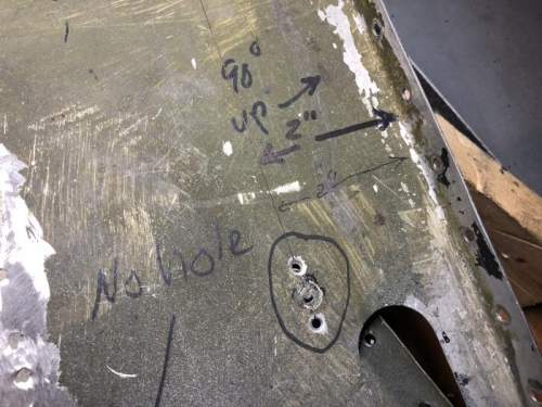 Old floorboard, screw line marked.