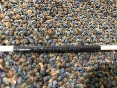 Shrink wrap label on ELY antenna, removed.