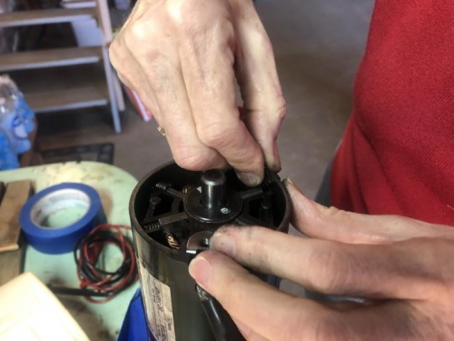 CJ inserting brush springs.