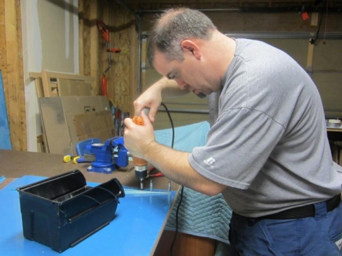 Drilling stiffebers to rudder skin