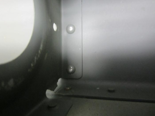 Rivet at other removed tab