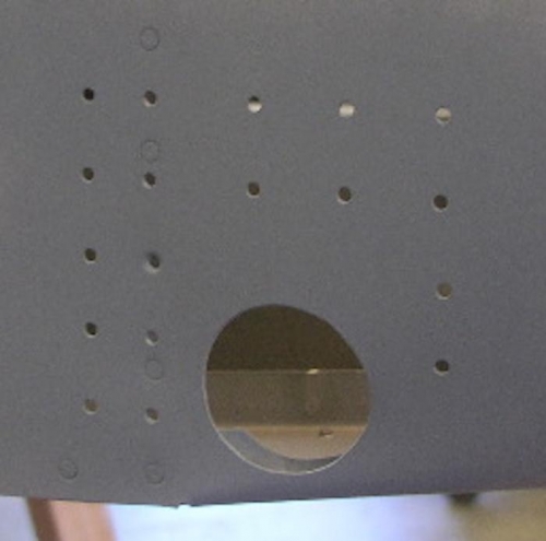 Holes cut with holesaw and opened with the Dremel bit.