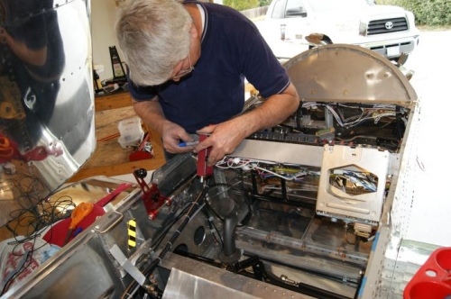 Phil marking locations to drill holes for rivets