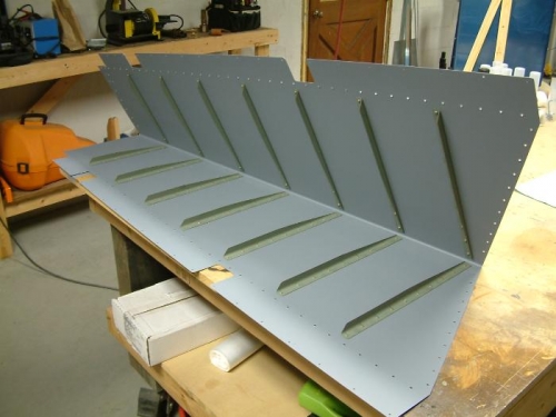 Backriveted primed stiffeners