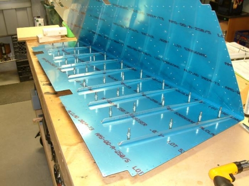 The stiffeners attached to the rudder skin and match drilled.