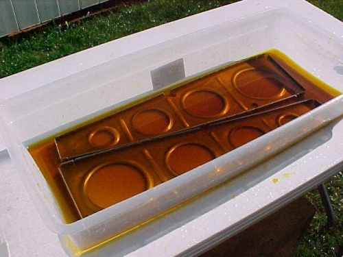 After Alumiprep, the ribs are submerged in alodine, then rinsed with water.