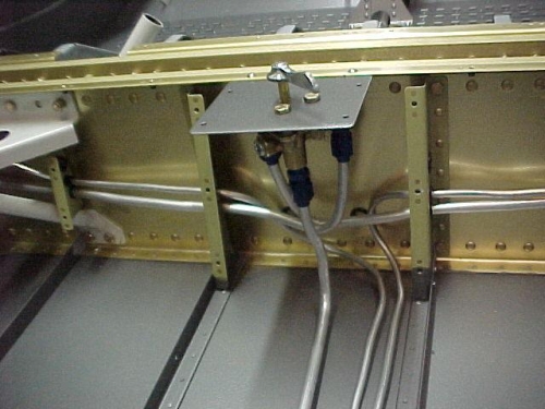 The fuel valve in place with the tubing flared and connected.