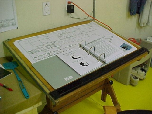 Plans on drafting table
