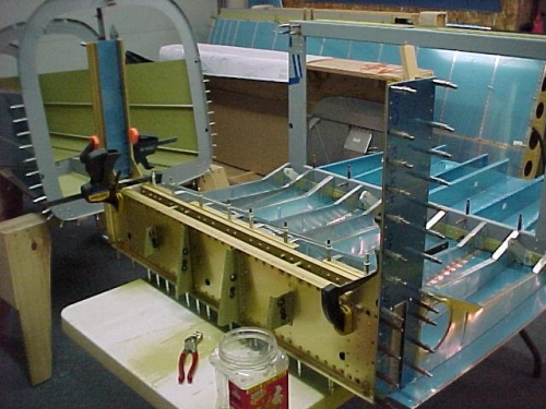 The center section takes shape with the addition of the front of the F-904 and the side doublers.