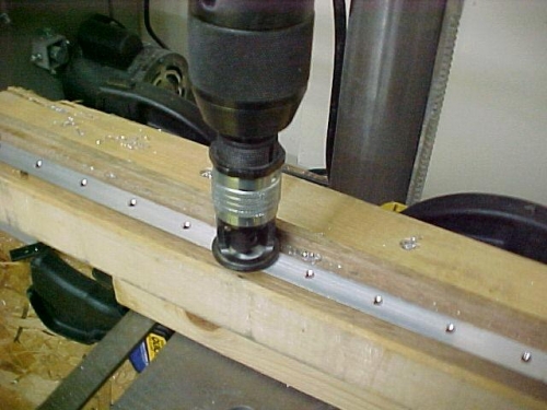 Using the drill press and jig to countersink trailing edge