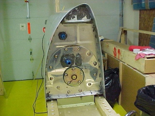 Cover plate and sender unit secured to left wing