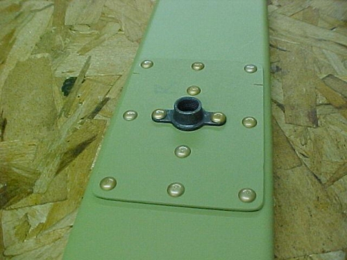Nut plates and plates riveted to right elevator spar