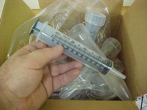 Syringes for pro-seal (tank construction)