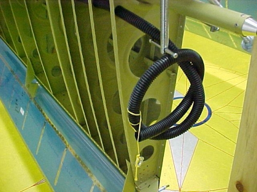 Plastic conduit in place with string
