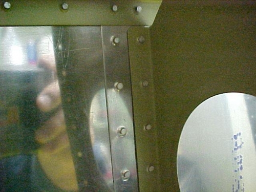 Inside view of the rivets joining the  two top skins