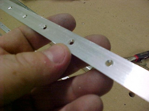 Trailing edge aluminum with holes countersunk on both sides