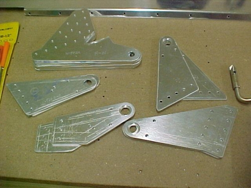 Flap and aileron brackets ready for priming