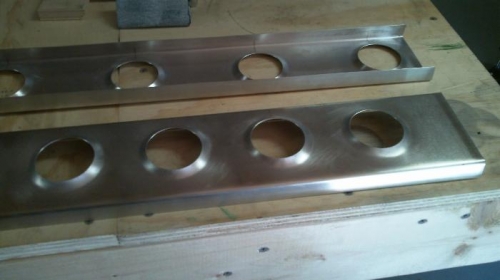 close up of flanged holes