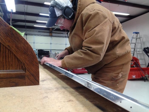 Using the die grinder with mini scotchbrite wheel on the rear spar