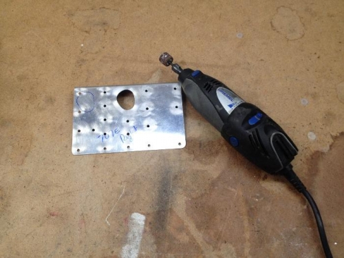 using the dremel tool to shape up the aleron push rod hole