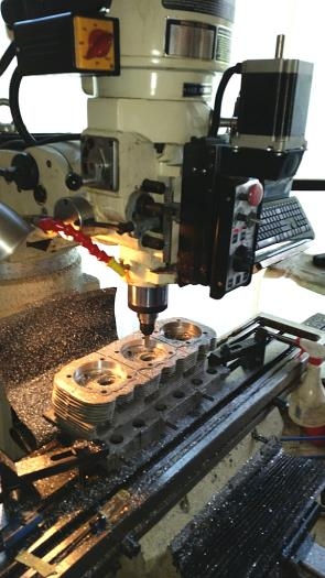 Brady's CNC mill cutting counterbore to fit VW cylinders