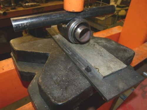 Tool in press prior to creating the dimple