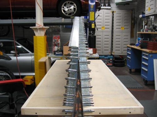 Against Straight Edge After Drilling