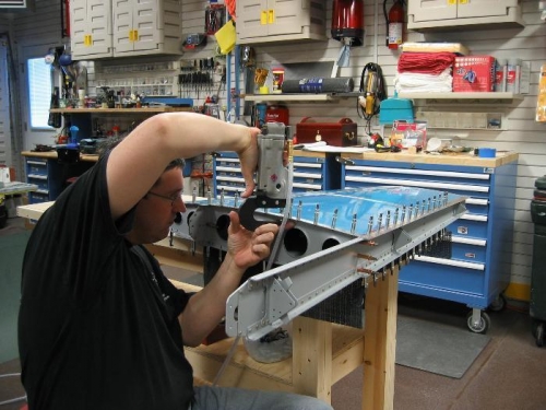 Me Riveting the Bottom Row (for the FAA)