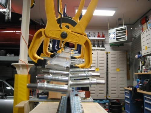 Clamped to Straight Edge Until Dry