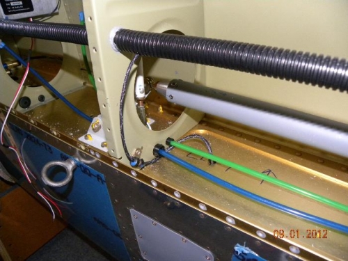 Protective sleeve routed up into conduit