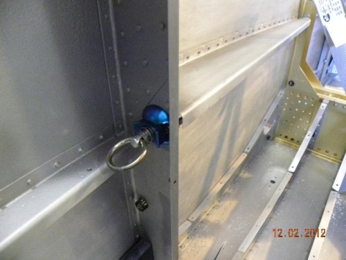 Tie-down behind seats (typ.)