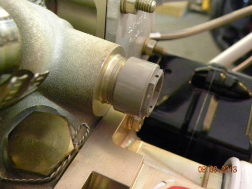 Aluminum cap from Andair installed over tachometer gear drive.