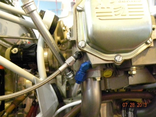 Steel resitrictor fitting and braided stainless line going to manifold pressure guage