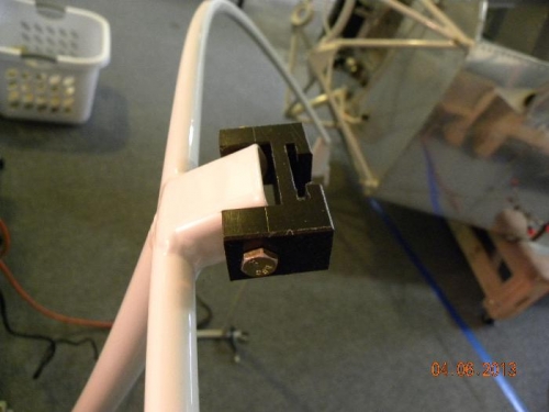 Rear slider block drilled to canopy frame bow