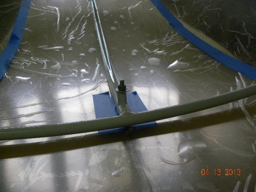 temporary bolt to hold frame in center