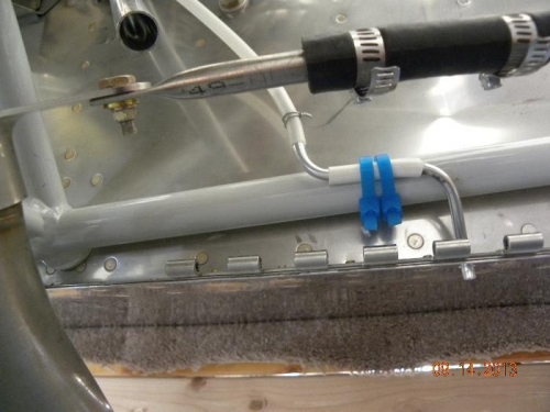 Overflow Exits through bottom firewall flange