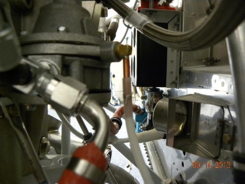 Safety wired to copper spigot exiting the fuel pump