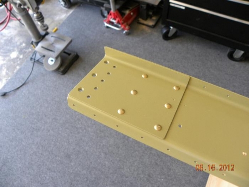 Outboard end of left rear spar