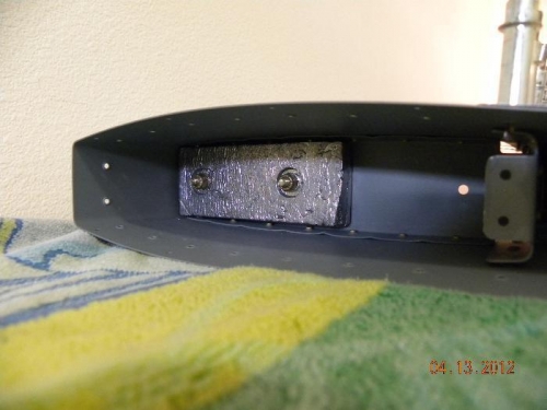 Lead counterweight in top of rudder counterbalance rib